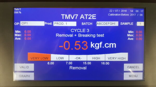 Digital torque meter display showing test results.