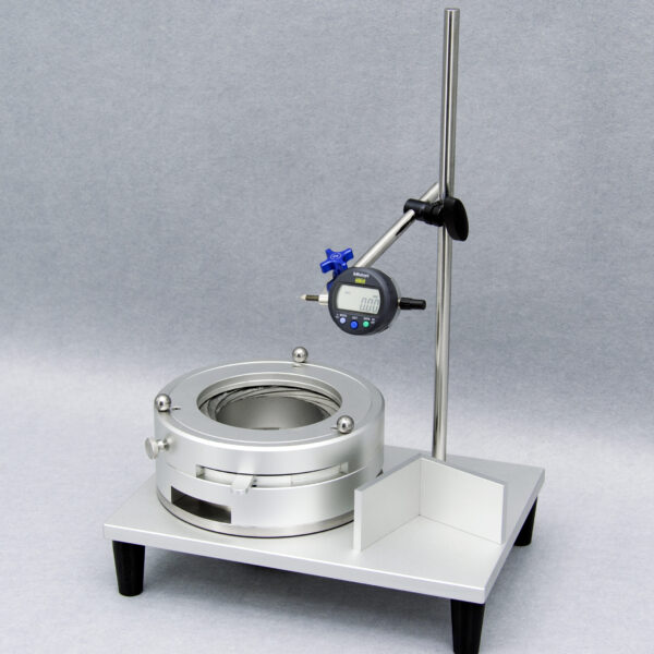 UBPT-1/1S Universal Bottle Perpendicularity Tester measuring a glass bottle