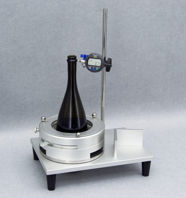 Universal Bottle Perpendicularity Tester model UBPT-1 testing a glass bottle