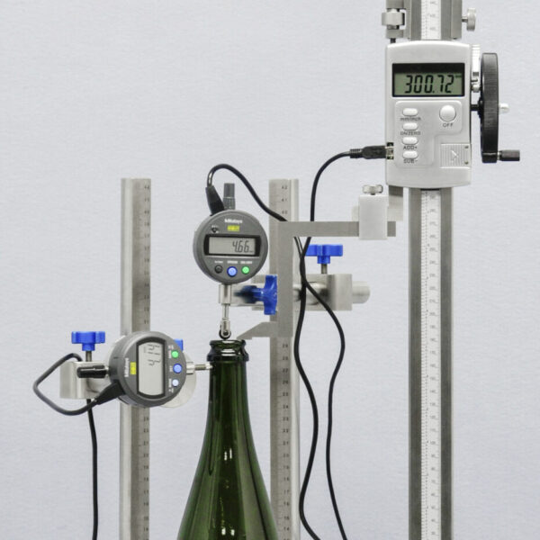 UBPT-3 Universal Bottle Perpendicularity Tester with mouth clearance and height gauges for precise measurement.