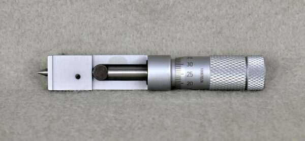 CSM Can Seam Micrometer for precise seam thickness and length measurement.