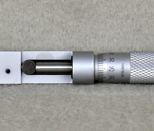 CSM Can Seam Micrometer for precise seam thickness and length measurement.