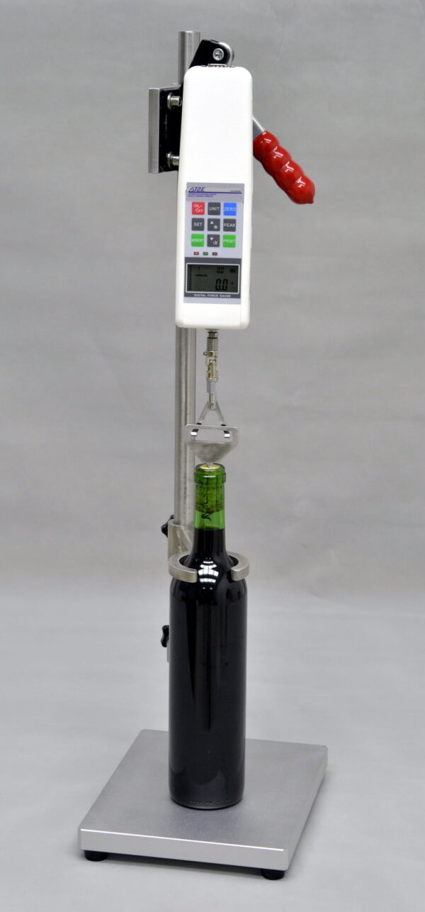 CET Cork Extraction Tester measuring cork insertion and extraction forces in a wine bottle